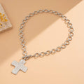 HAMMERED CROSS FRONT TOGGLE NECKLACE