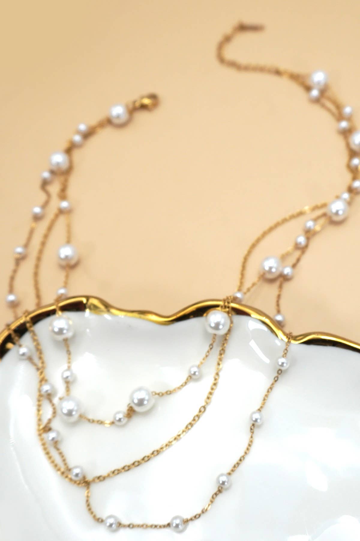 PEARL THREE LAYERED NECKLACE